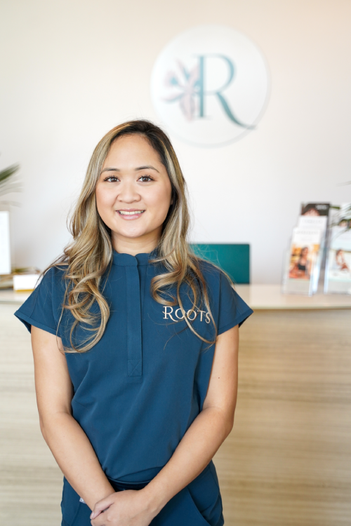 Victoria Vo, Aesthetician at Roots Wellness and Medspa in Tampa, Florida.