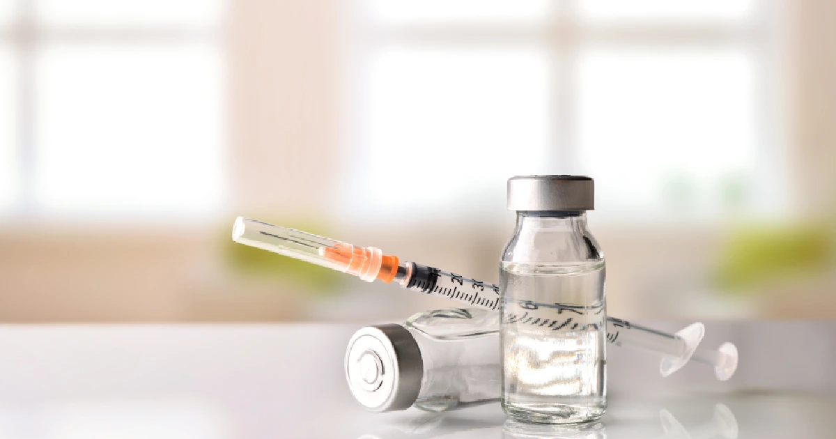 Vials and syringe prepared for peptide injection therapy to boost energy in Tampa, FL