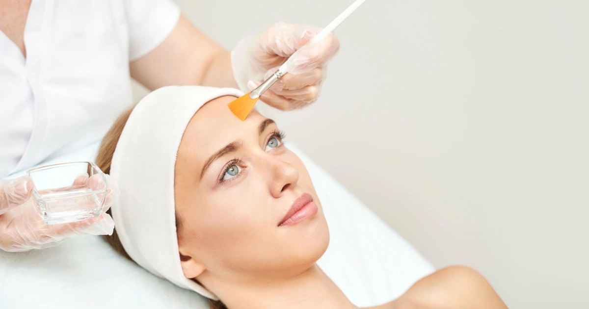 Woman receiving a VI Chemical Peel treatment in Tampa, FL from a professional for even, radiant skin