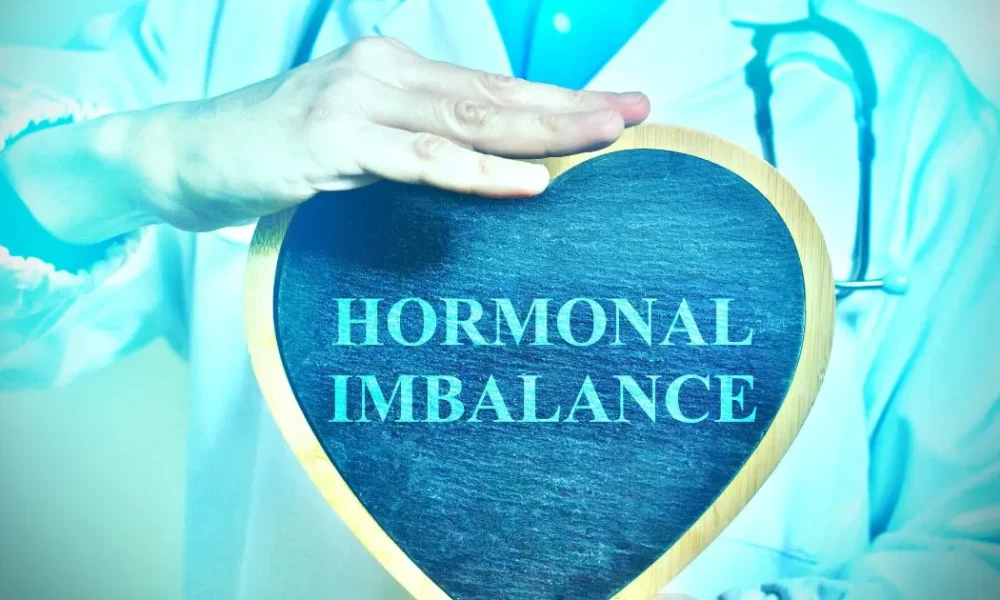 Medical professional measuring blood pressure to monitor cardiovascular health during Hormone Replacement Therapy at Roots Wellness, Tampa