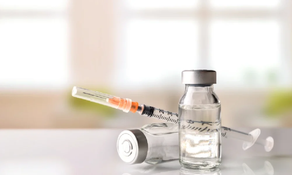 Vials and syringe prepared for peptide injection therapy to boost energy in Tampa, FL