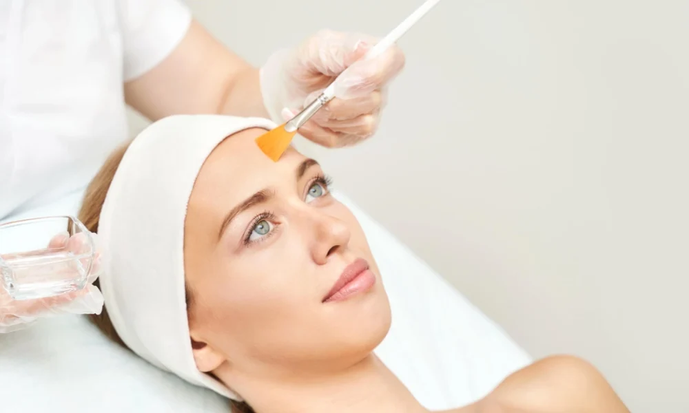 Woman receiving a VI Chemical Peel treatment in Tampa, FL from a professional for even, radiant skin