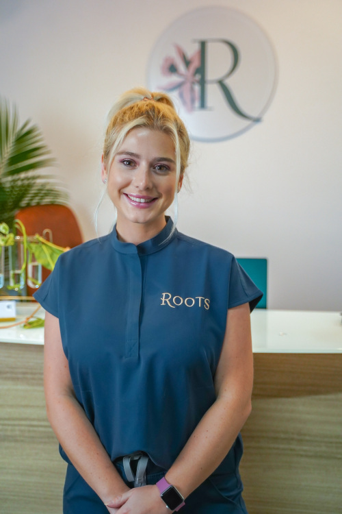Kayla King, Patient Care Coordinator at Roots Wellness and Medspa in Tampa, Florida.