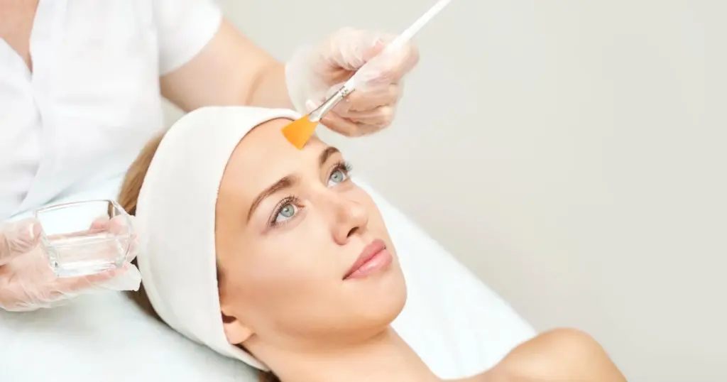 Woman receiving a VI Chemical Peel treatment in Tampa, FL from a professional for even, radiant skin
